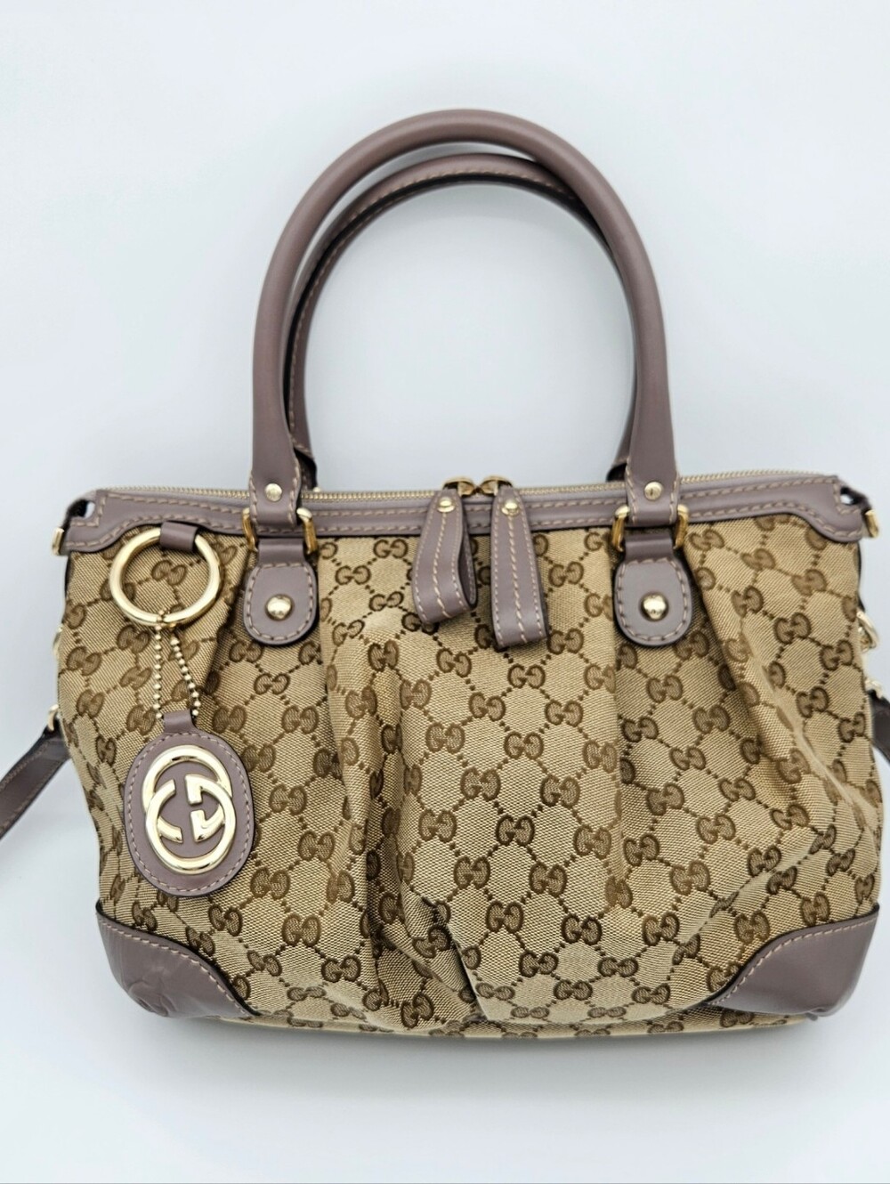 Authentic Gucci GG Canvas Sukey #4381M
